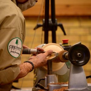 Working on the spindle which is attached to the base.
